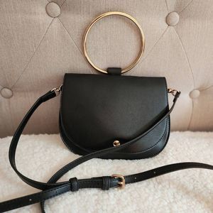 Madison West PU Crossbody purse gold loop wristlet